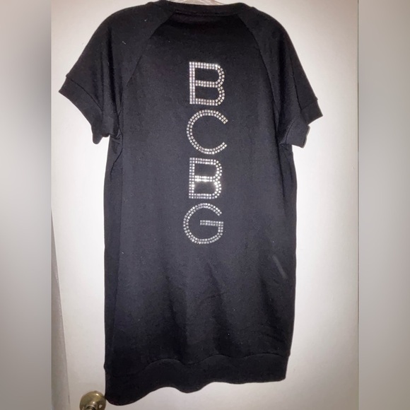 BCBGMaxAzria Dresses & Skirts - BCBG Black knit dress with studded Logo